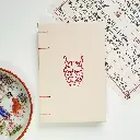 Notes A6 kremowy z maską hannya