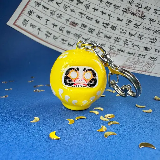 Brelok daruma żółta