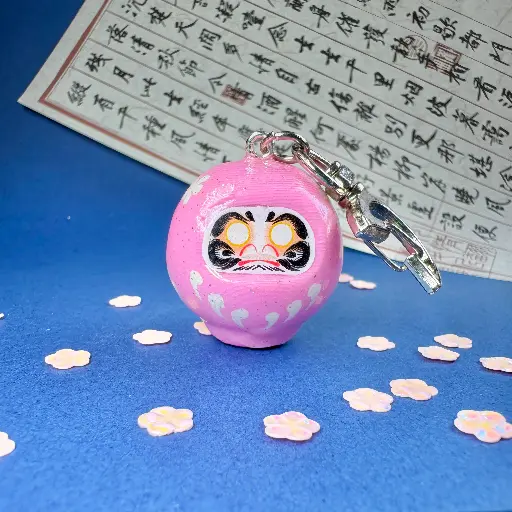 Brelok daruma różowa