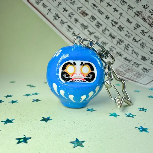 Brelok daruma niebieska
